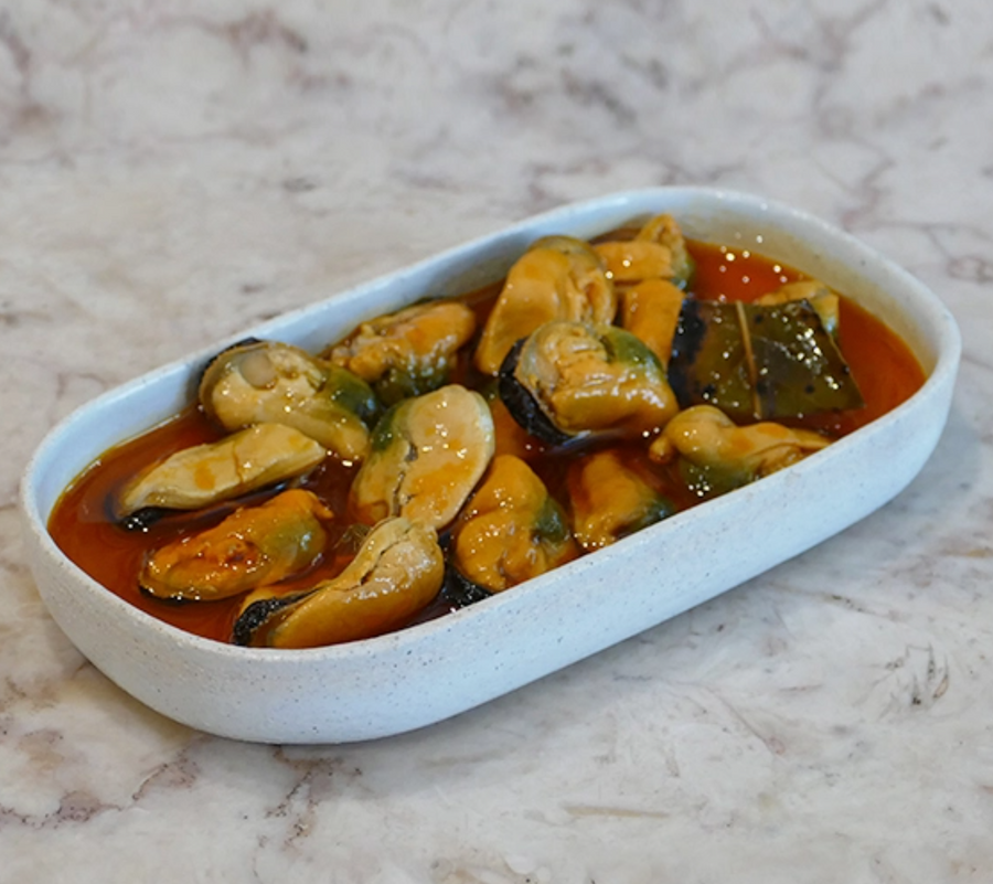 Plate of Miss Can Marinated Mussels in Escabeche Sauce
