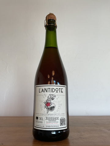 A bottle of Domaine des Grottes 'L' Antidote'