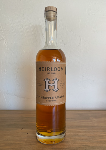 Bottle of Heirloom Pineapple Amaro Liqueur